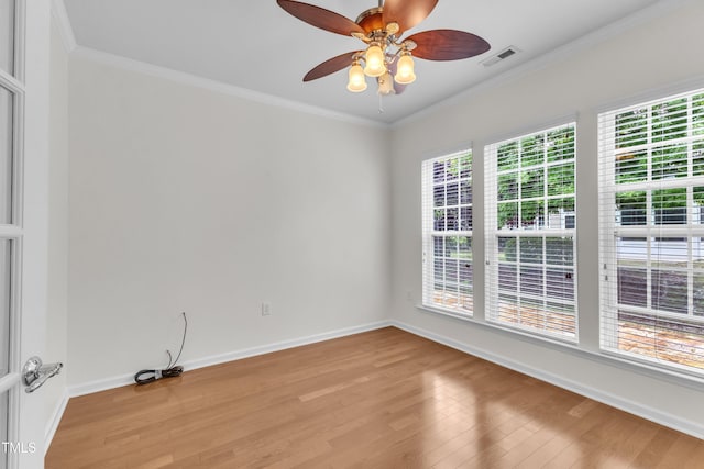 113 Dowington Ln, Cary, NC 27519 - empty room featuring light wood-style floors, crown molding, a ceiling fan, and baseboards