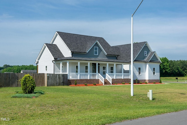 view of front of house featuring covered porch and roof with shingles
