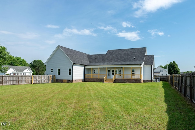 rear view of property featuring crawl space and a shingled roof