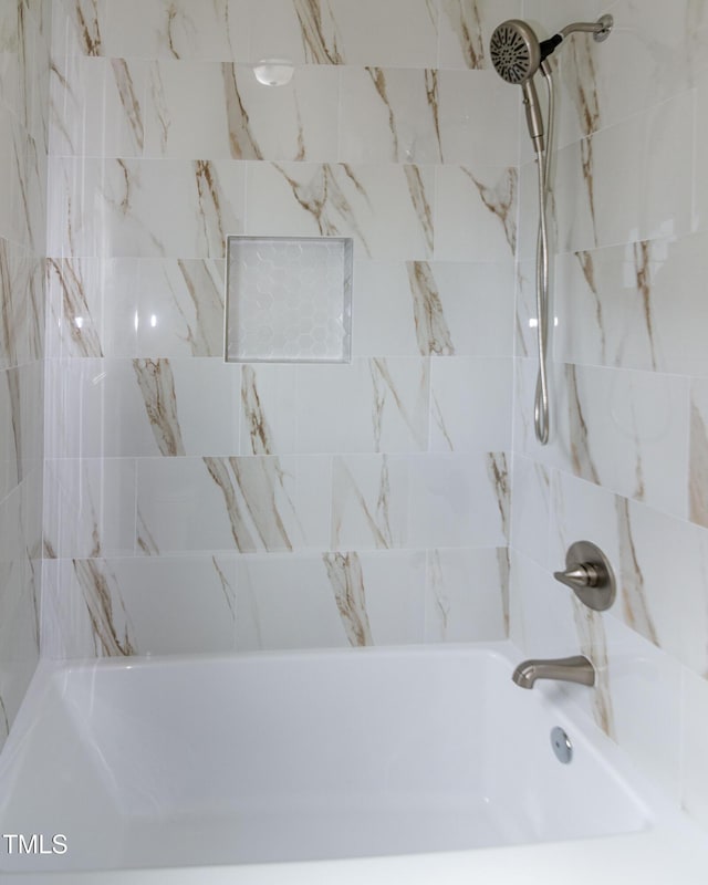bathroom featuring shower / bath combination