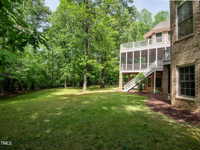 540 Vista Del Lago Ln, Wake Forest, NC 27587 - view of grassy yard featuring a sunroom and stairway