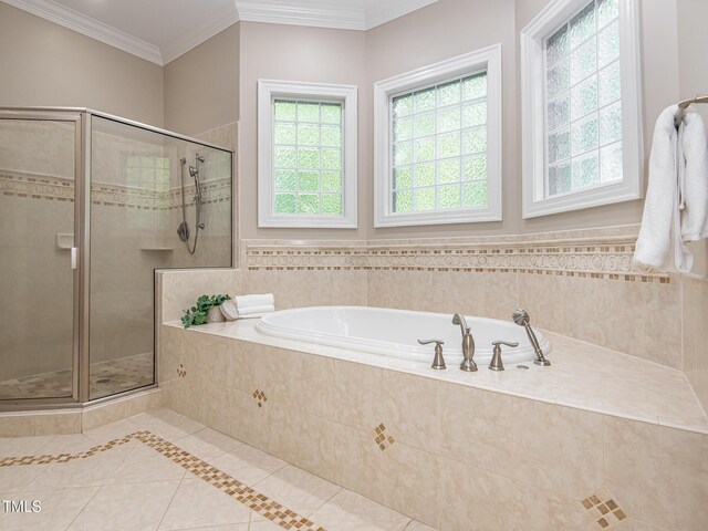 540 Vista Del Lago Ln, Wake Forest, NC 27587 - bathroom featuring tile patterned floors, a bath, a stall shower, and crown molding