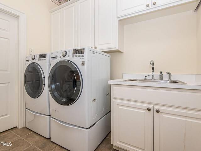 540 Vista Del Lago Ln, Wake Forest, NC 27587 - washroom featuring cabinet space, independent washer and dryer, and light tile patterned floors