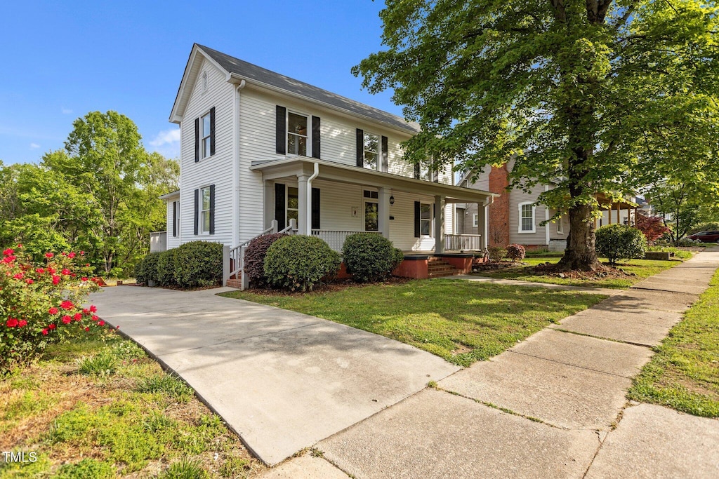 116 W Front St, Oxford, NC 27565 - view of front of property with a front yard and covered porch
