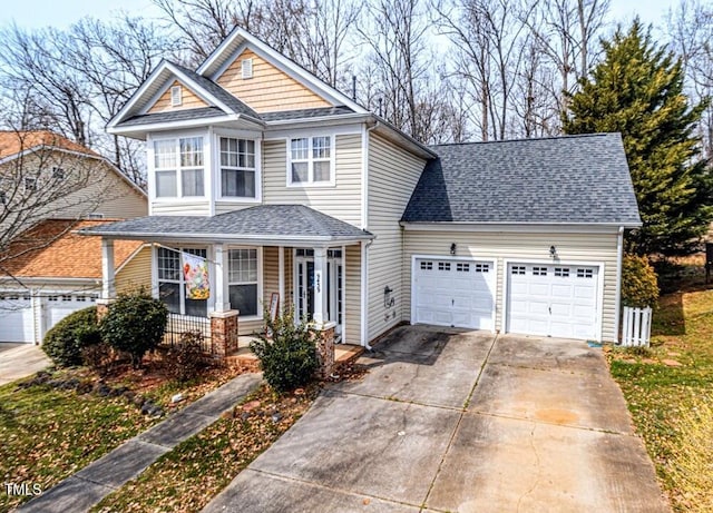 view of front of home featuring a garage, roof with shingles, concrete driveway, and covered porch