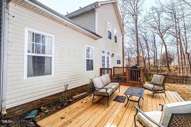 deck featuring fence