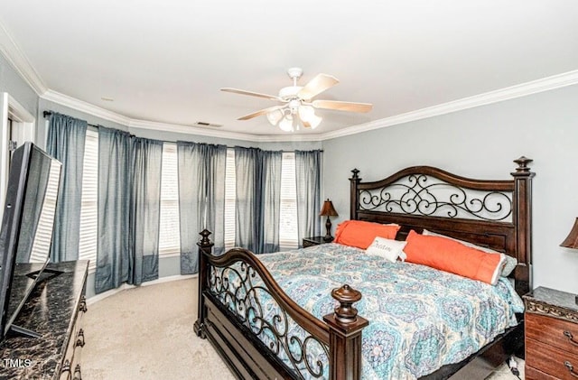 bedroom with light carpet, visible vents, ornamental molding, and ceiling fan