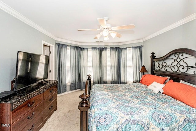 bedroom featuring light carpet, ceiling fan, and crown molding