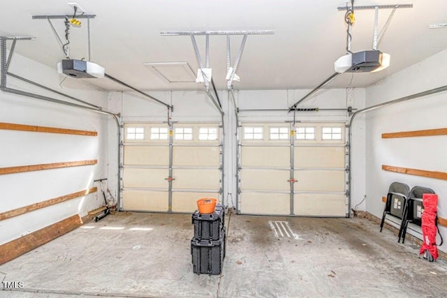 garage featuring a garage door opener