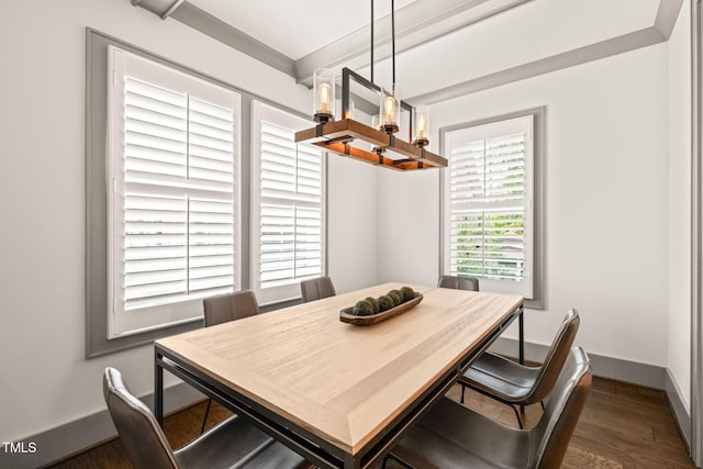 905 E Lenoir St, Raleigh, NC 27610 - dining area with a chandelier, wood finished floors, and baseboards