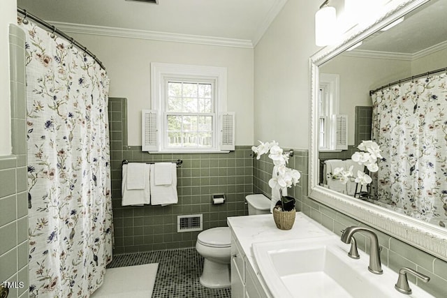 full bathroom with crown molding, visible vents, toilet, tile walls, and tile patterned floors