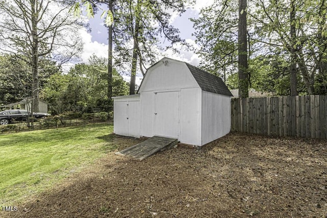view of shed with fence