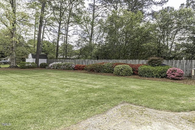 view of yard with fence