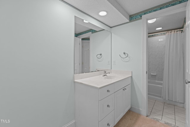 full bath with shower / bathtub combination with curtain, vanity, tile patterned flooring, and baseboards