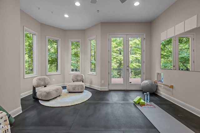 exercise area with recessed lighting and baseboards