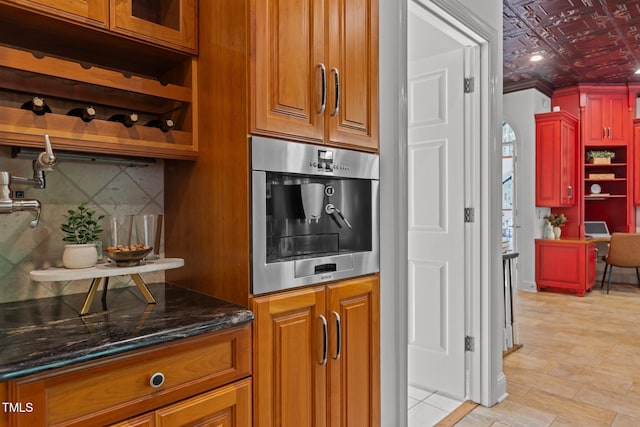 bar with oven, an ornate ceiling, and tasteful backsplash