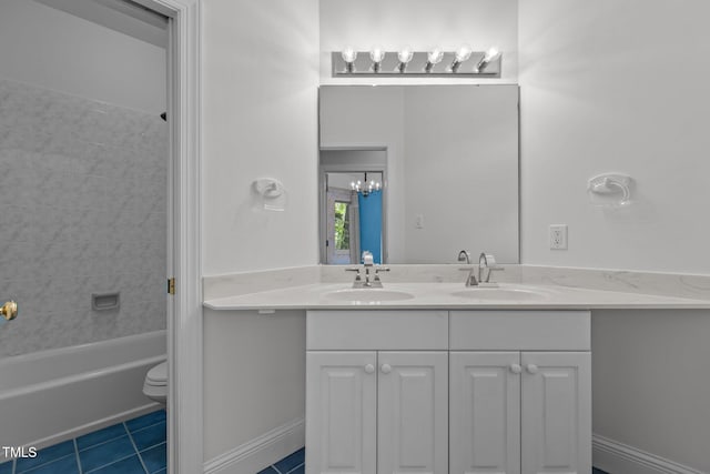 full bath with toilet, tile patterned flooring, a sink, and double vanity