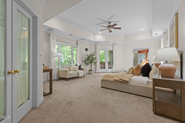 carpeted bedroom with a raised ceiling, crown molding, access to outside, and recessed lighting
