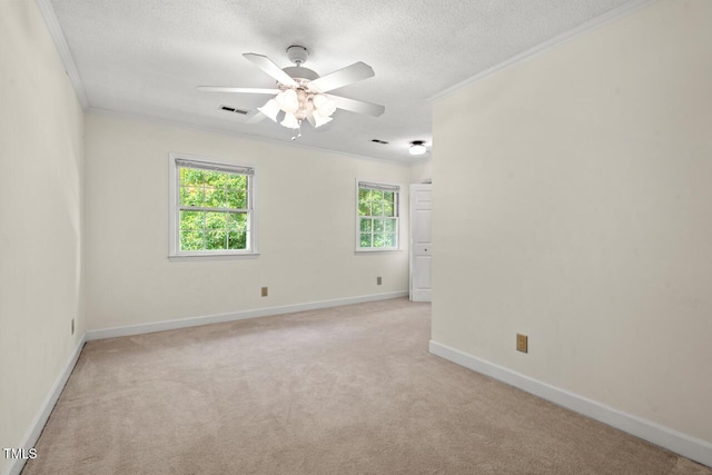 6321 Malvern Ln, Hillsborough, NC 27278 - unfurnished room with crown molding, light carpet, baseboards, a textured ceiling, and ceiling fan