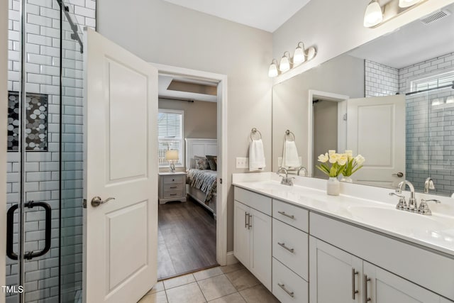 1209 Big Field Dr, Castle Hayne, NC 28429 - full bath with a sink, visible vents, a stall shower, and ensuite bath