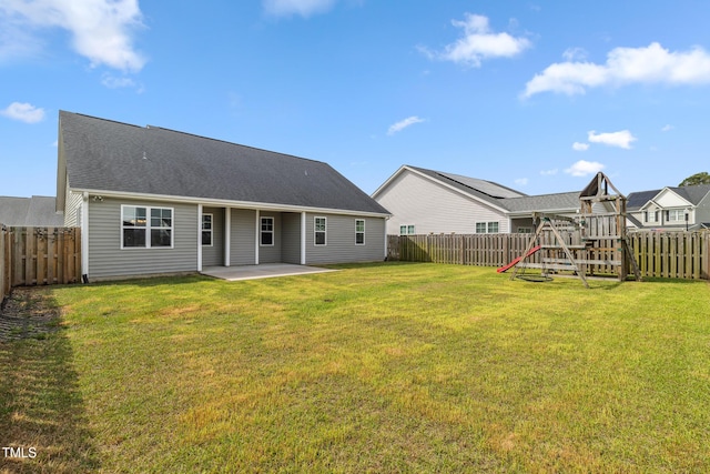 1209 Big Field Dr, Castle Hayne, NC 28429 - rear view of property with a yard, a fenced backyard, and a patio