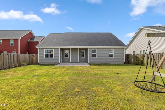 1209 Big Field Dr, Castle Hayne, NC 28429 - rear view of property featuring a patio, a fenced backyard, and a yard