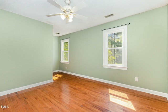 3109 E Folkestone Pl, Raleigh, NC 27604 - unfurnished room with plenty of natural light, visible vents, baseboards, and light wood-type flooring