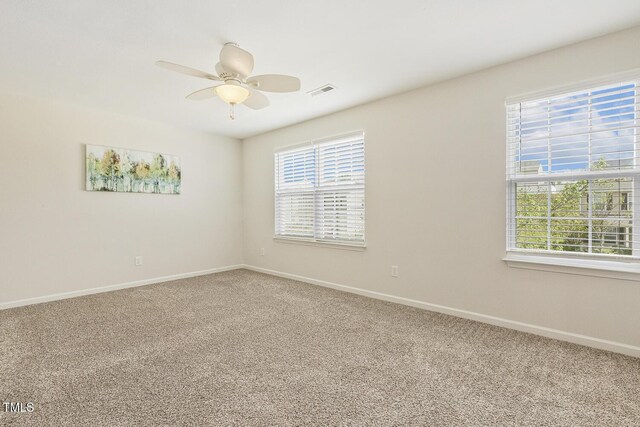 4817 Quarryman Rd, Raleigh, NC 27610 - carpeted spare room featuring ceiling fan, baseboards, and plenty of natural light