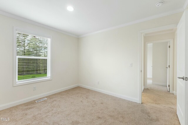 7122 Guess Rd, Hillsborough, NC 27278 - empty room with ornamental molding, visible vents, carpet floors, and baseboards