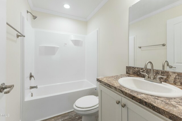 7122 Guess Rd, Hillsborough, NC 27278 - full bath with vanity, toilet, bathtub / shower combination, ornamental molding, and wood finished floors