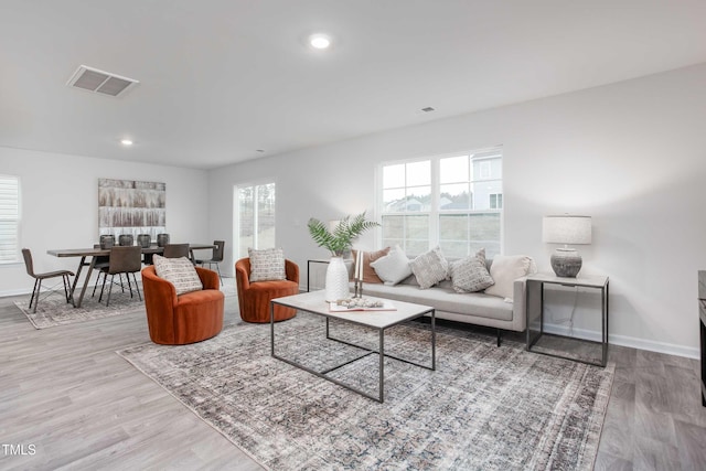 2134 Monk Dr, Haw River, NC 27258 - living area with wood finished floors, baseboards, and recessed lighting