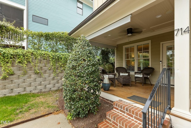 view of patio featuring outdoor lounge area, a wooden deck, and ceiling fan