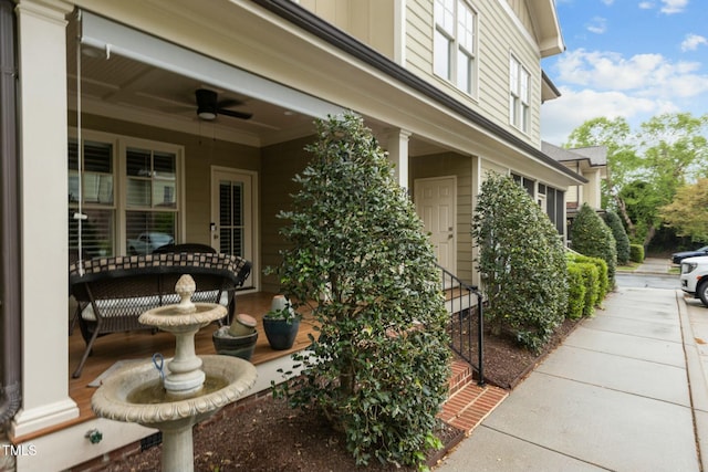 exterior space featuring a ceiling fan