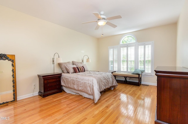 113 Beeley Ct, Cary, NC 27519 - bedroom featuring light wood-style flooring, baseboards, and a ceiling fan