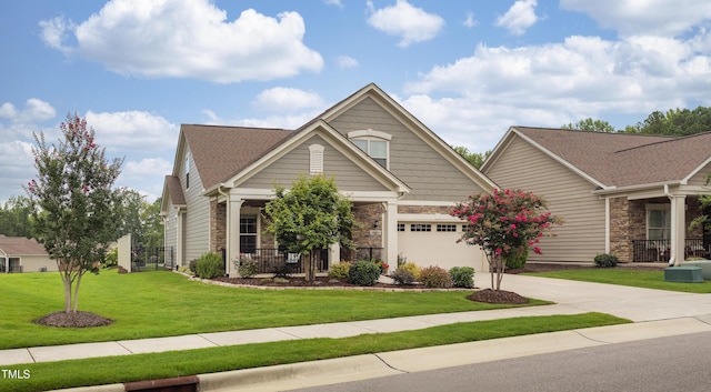 1005 Vesper Ct, Durham, NC 27703 - craftsman inspired home with stone siding, concrete driveway, a garage, a front lawn, and cooling unit