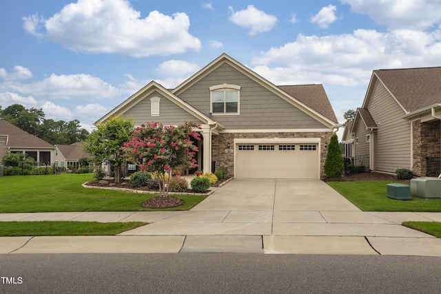 1005 Vesper Ct, Durham, NC 27703 - craftsman-style home with stone siding, a front lawn, and concrete driveway