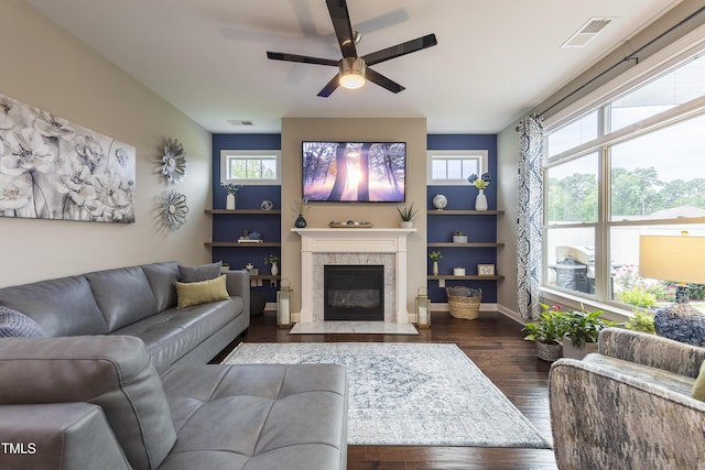 1005 Vesper Ct, Durham, NC 27703 - living area with ceiling fan, hardwood / wood-style floors, a high end fireplace, and baseboards