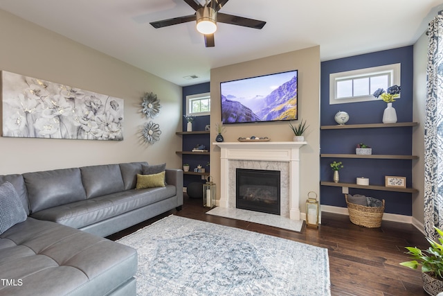 1005 Vesper Ct, Durham, NC 27703 - living room featuring a ceiling fan, healthy amount of natural light, wood finished floors, and a high end fireplace