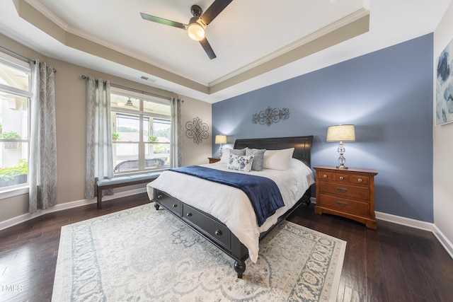 1005 Vesper Ct, Durham, NC 27703 - bedroom with a raised ceiling, wood-type flooring, crown molding, baseboards, and ceiling fan