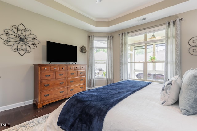 1005 Vesper Ct, Durham, NC 27703 - bedroom featuring ornamental molding, dark wood-style floors, baseboards, and access to exterior