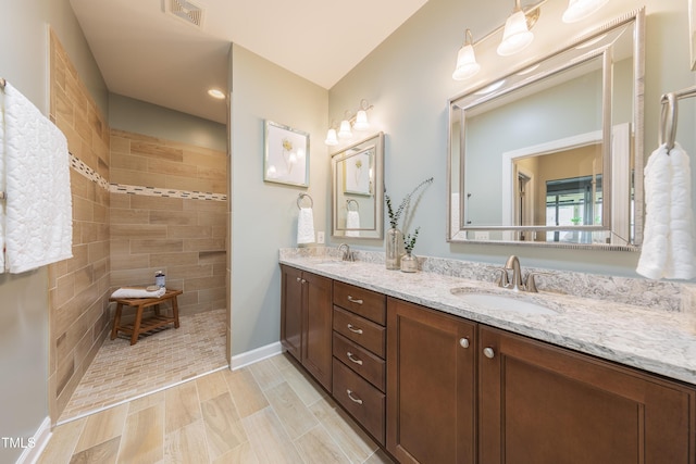 1005 Vesper Ct, Durham, NC 27703 - full bath with walk in shower, double vanity, and baseboards
