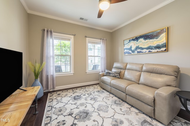 1005 Vesper Ct, Durham, NC 27703 - living area featuring wood finished floors, ceiling fan, crown molding, and baseboards
