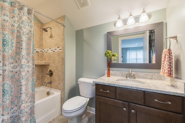 1005 Vesper Ct, Durham, NC 27703 - bathroom featuring toilet, shower / bath combo, vaulted ceiling, vanity, and baseboards