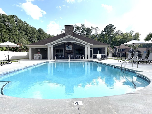 1005 Vesper Ct, Durham, NC 27703 - community pool featuring a patio and fence