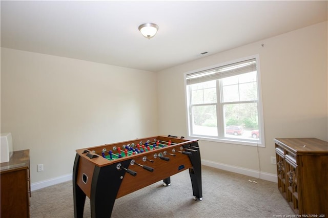 rec room featuring visible vents, baseboards, and carpet flooring