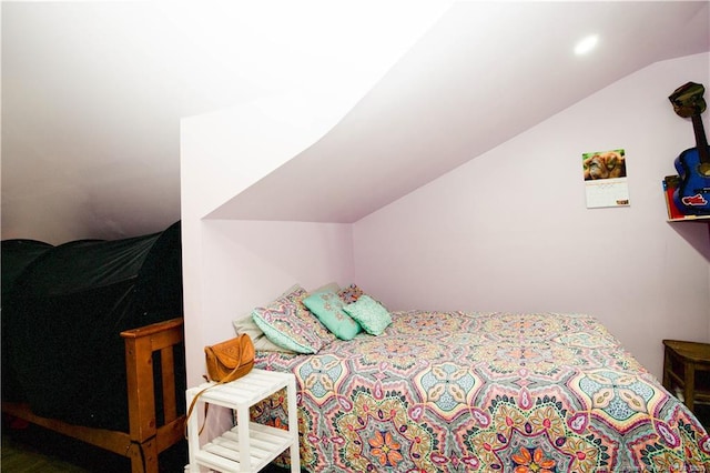 bedroom with vaulted ceiling