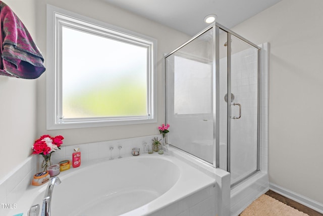 95 Shady Creek Trl, Garner, NC 27529 - full bath featuring a shower stall, recessed lighting, a bath, and tile patterned flooring