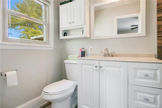 half bath with toilet and vanity