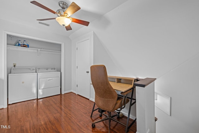 home office featuring visible vents, baseboards, ceiling fan, wood finished floors, and washer and clothes dryer