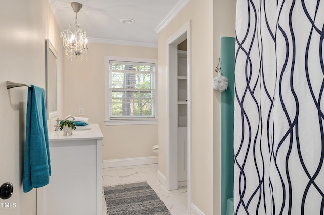 full bathroom featuring baseboards, ornamental molding, toilet, vanity, and marble finish floor